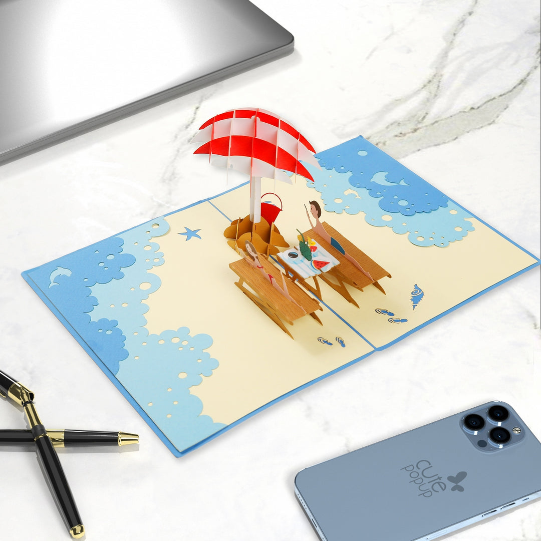 Young Couple on Beach Pop Up Card