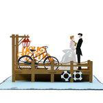 Load image into Gallery viewer, Romantic Bride &amp; Groom on the Quay Pop Up Card
